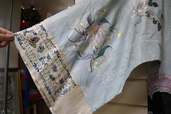 A Chinese embroidered silk robe, eau de nil ground, late Qing